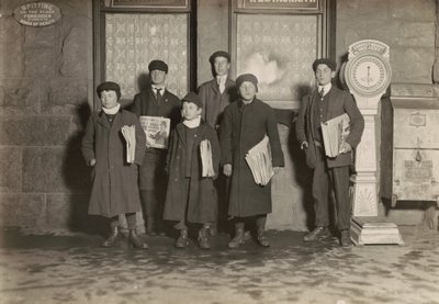 8:30 P.M. Group of Newsboys Selling at Depot, Hartford, Connecticut, March 1909 by Lewis Wickes Hine