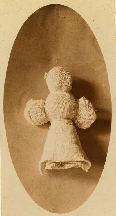 A Doll Made from Waste Material by a Child in a Knitting Mill Where Mother Works by Lewis Wickes Hine