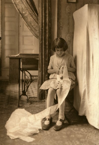 A Young Girl Cutting Lace at Her Home in New York City by Lewis Wickes Hine