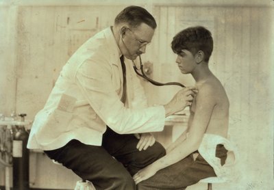 Doctor Examining Young Mill Worker, Cheney Silk Mills, South Manchester, Connecticut by Lewis Wickes Hine