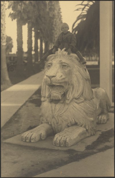Child on Lion Statue by Louis Fleckenstein
