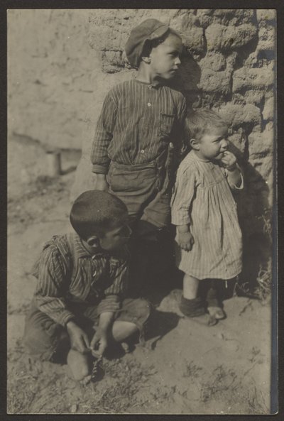 Children Against Stone Wall by Louis Fleckenstein
