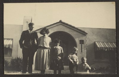 Family Portrait Before House by Louis Fleckenstein