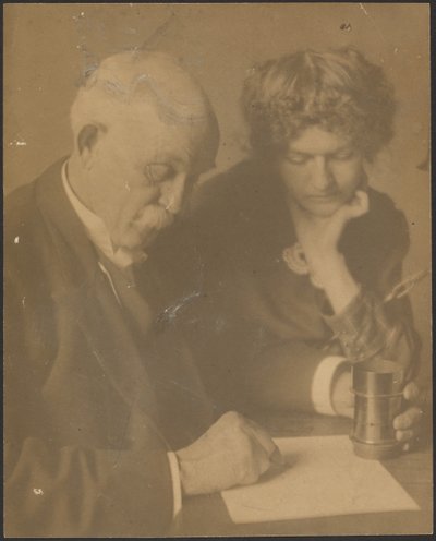 Portrait of a Woman and Man at Table by Louis Fleckenstein
