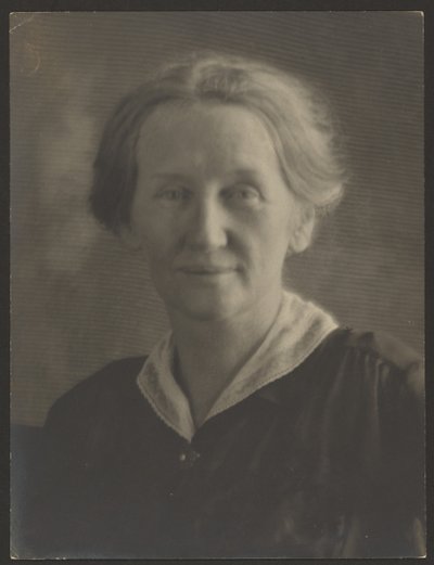 Portrait of a Woman with Pearl Pin by Louis Fleckenstein