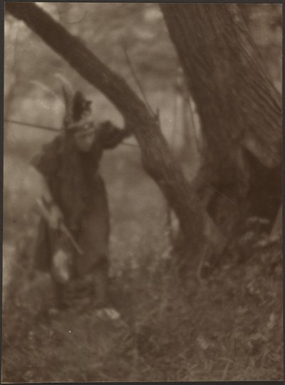 [Woman in Head Dress Behind Tree] by Louis Fleckenstein