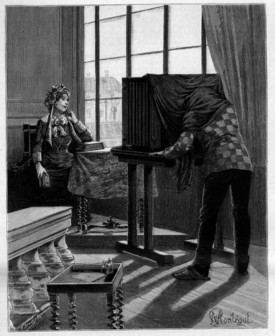 Photographer in His Studio Taking a Photograph with a Darkroom. In 