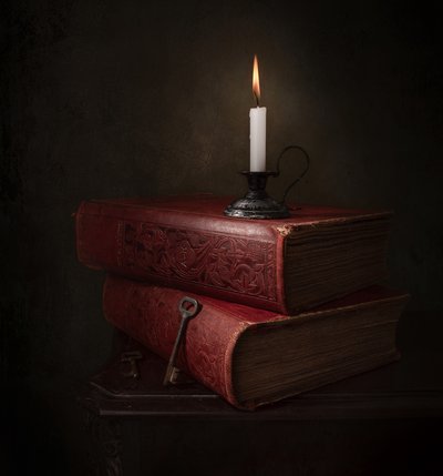 Candlelit Books and Key by Margareth Perfoncio