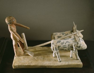Funerary model of a ploughman leading his plough drawn by two oxen by Middle Kingdom Egyptian