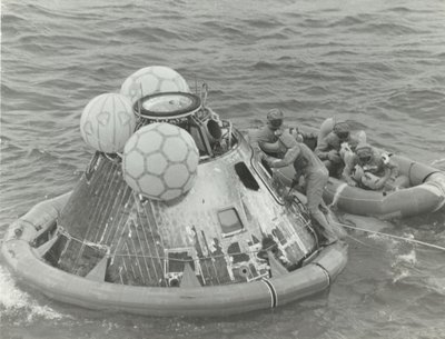 Astronauts in Lifeboat After Apollo 11 Splashdown by NASA Images