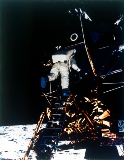 Buzz Aldrin descends from the Lunar Module, Apollo II mission by Neil Armstrong
