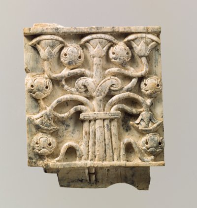 Furniture plaque carved in relief with stylized tree by Neo Assyrian