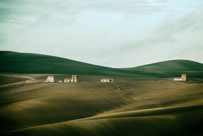 Rolling Hills Distant Homes by Nicola Figliuolo