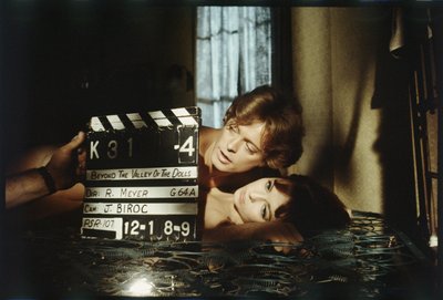 Michael Blodgett and Dolly Read on set in 