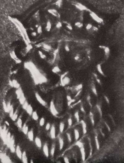 Head of a lion on a One Shilling coin by Paul Henning