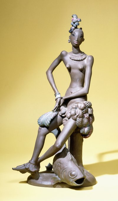An African Dancer Seated with a Large Fish at Her Feet, a Karlsruhe Terracotta Figure by Paul Scheurich