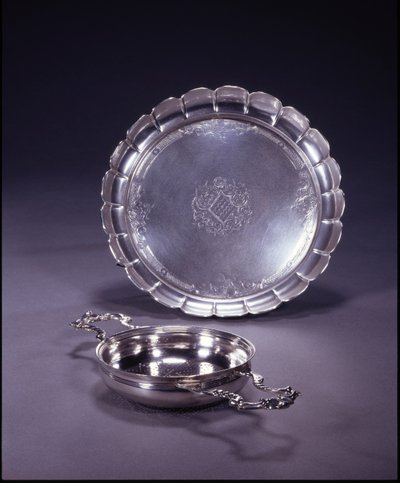 George II orange strainer, circular bowl with two openwork shell and scroll handles by Paul de Lamerie