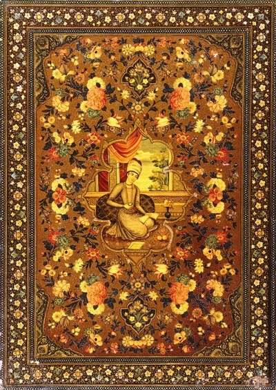 A Zand Book Cover Painted with a Central Seated Figure within an Interior, Surrounded by Floral Sprays by Persian School