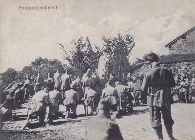 German army soldiers participating in an open air church service by Photographer German