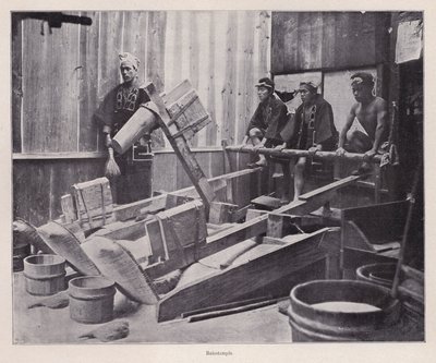 Dehulling rice or making rice flour using a rice pounder, Japan by Photographer Japanese
