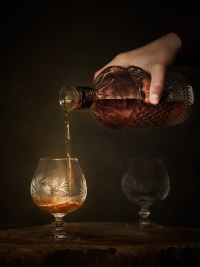 Pouring Fine Spirits by Radek Pohnan