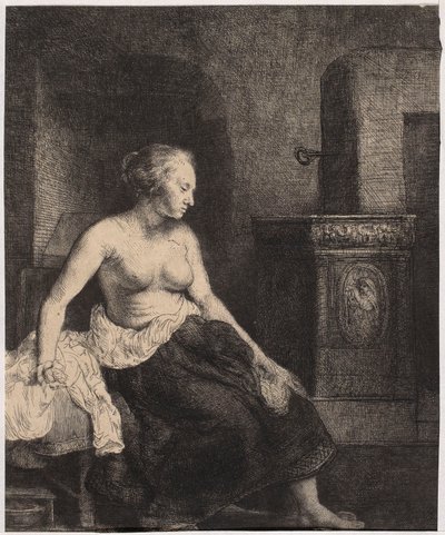Half-Naked Woman Sitting by the Stove by Rembrandt van Rijn