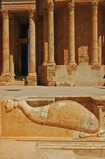 Dolphin carving in front of stage, Sabratha, Libya, c.190 AD by Roman
