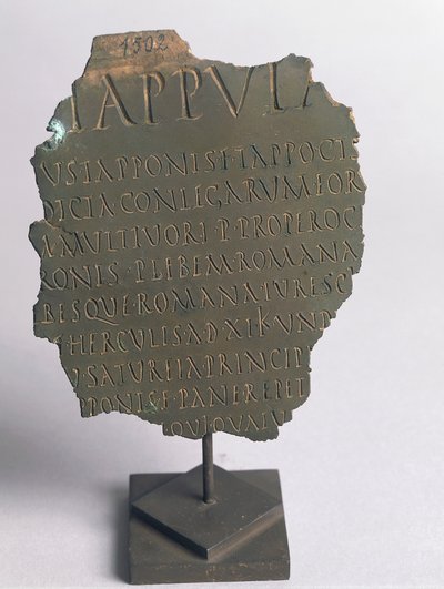 Lex Tappula, fragment of satirical law drawn up by convivial circle from Vercelli, parody written in same form as Roman plebiscite laws, forming part of leges conviviales which were handed down by Festo, bronze, Roman civilization by Roman