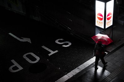 Red Umbrella Night Walk by Satoshi Hata