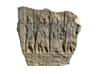 Fragment of Assyrian relief showing soldiers escorting loot and captives from Babylon by School Assyrian