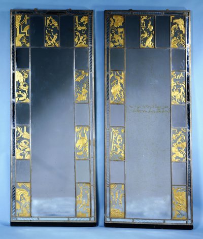 A pair of Orrefors mirrored doors, with circus scenes by Simon Gate