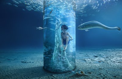 Boy in Ocean Column by Sulaiman Almawash