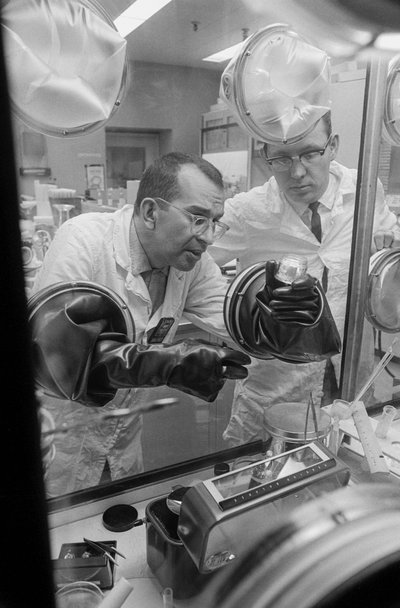 Technicians handle radioactive materials at Hanford operations of a plutonium recycling test reactor by Ted Spiegel