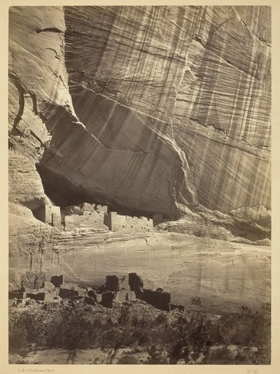Ancient Ruins in the Canyon de Chelly, N.M. In a niche 50 feet above present Canyon bed. by Timothy O