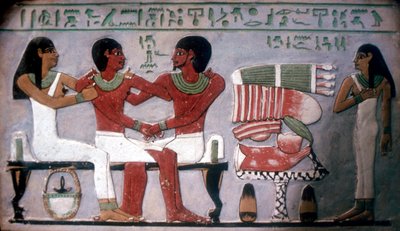 Relief of Imn-Hat seated with his wife & son in front of an offering by Unbekannt