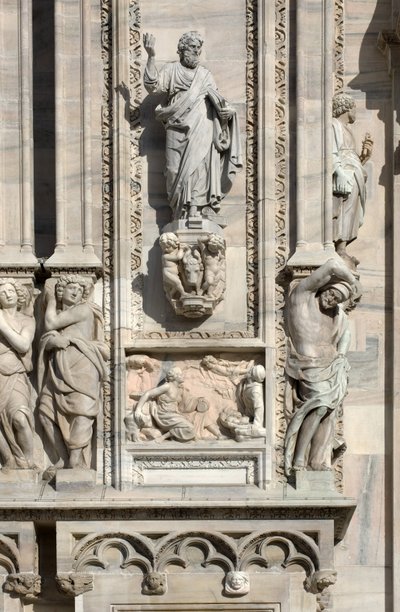 Architecture: statue of Saint Luke (1811), and low relief representing the appearance of the angel to Samson