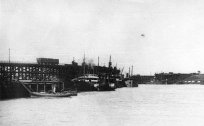 Blyth Harbour, Showing an Amount of Colliers Lying Alongside Blyth Staiths with a Harbour Commission Launch in the Foreground by Unbekannt