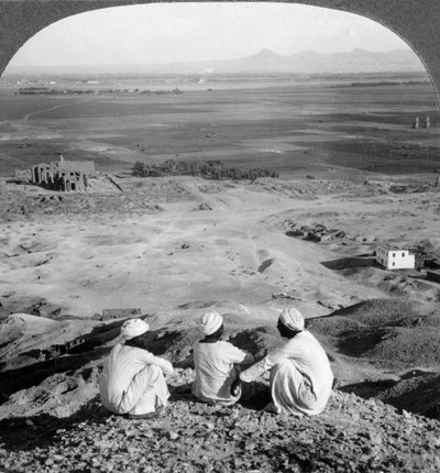 Across the plain of Thebes and past the Memnon statues from the cliffs, Egypt by Underwood and Underwood