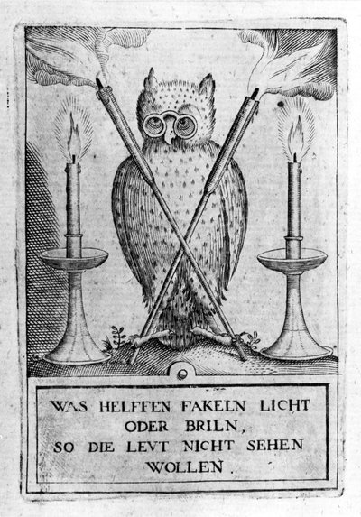 Owl with glasses, symbol of wisdom. Engraving from 