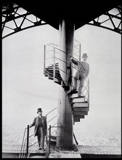 Gustave Eiffel and his son-in-law Adolphe Salles on the staircase of the Eiffel Tower, Paris by Unknown photographer