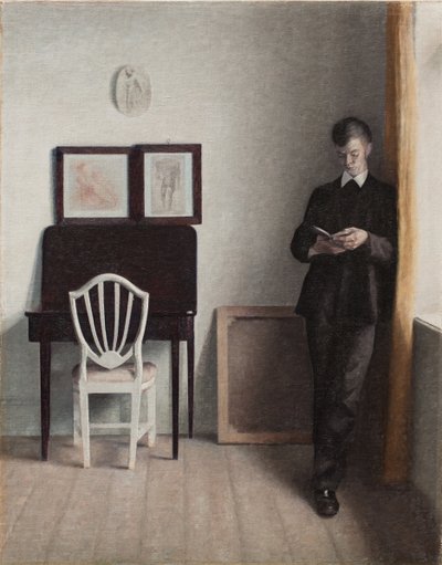 Interior with a Young Man Reading by Vilhelm Hammershoi