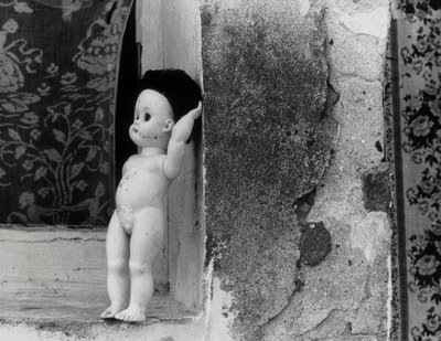 Doll on a Window Sill by Vincenzo Balocchi
