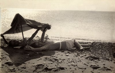 Two Women Lying on the Sea Shore in the Shade of a Towel. Postcard Sent by the Photographer to Vincenzo Balocchi by Vincenzo Balocchi