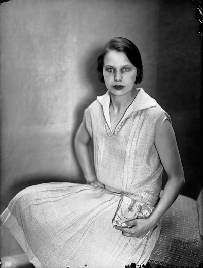 Portrait of Marion Wulz with a dress by Anita Pittoni, c.1930 by Wanda Wulz