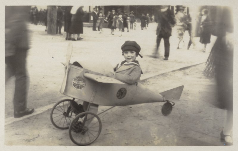 Boy in a Toy Aircraft by (after) English photographer