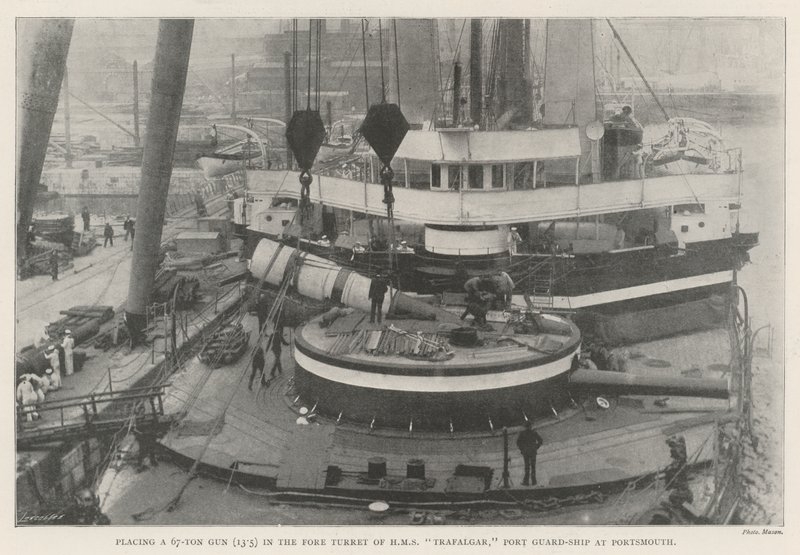 Placing a 67-Ton Gun (13.5) in the Fore Turret of HMS Trafalgar, Port Guard-Ship at Portsmouth by English Photographer