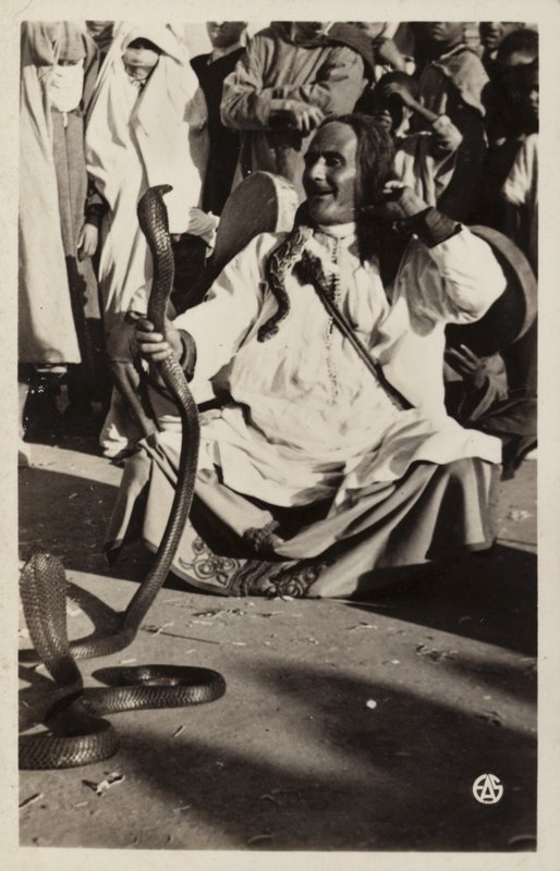 Scenes of North Africa: Snake charmer in the Souks by French Photographer