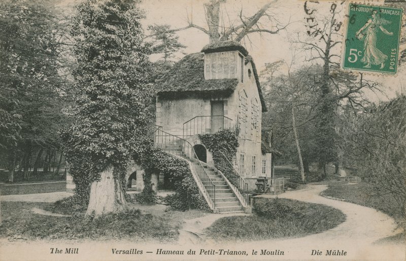 The mill at Hameau de la Reine, a rustic retreat built for Marie Antoinette in the park of the Chateau de Versailles near the Petit Trianon. Postcard sent in 1913 by French Photographer