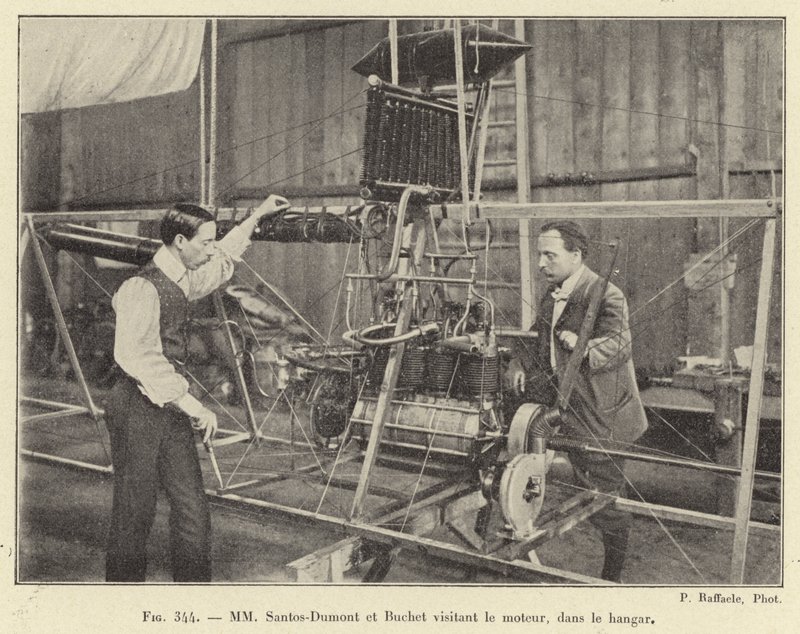 Santos-Dumont and Buchet visiting the engine in the hangar (engraving) by French School