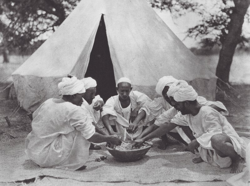 Africa: Arab Sailors at a Meal by Hugo Adolf Bernatzik